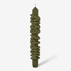 The CandleHand Happy Bday Taper Candle in olive on a grey background