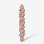 The CandleHand Love You 3D Taper Candle in cream on a grey background