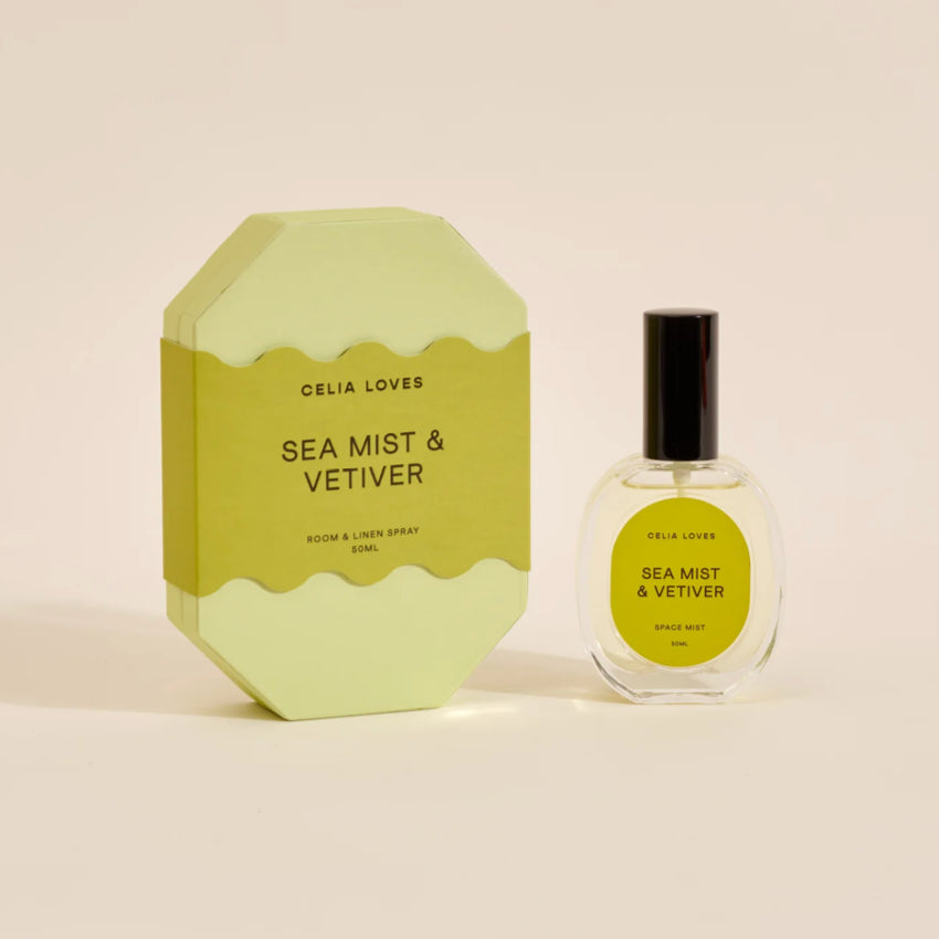 The Celia Loves Sea Mist and Vetiver Room and Linen Spray with it's box on a blank background