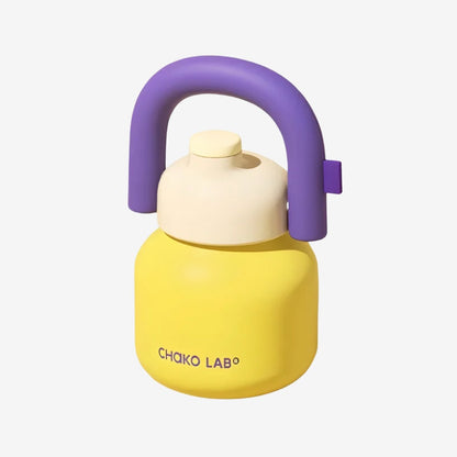 The Chako Lab Linlin Kettle bottle in yellow with purple handle on a white background