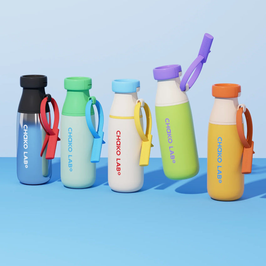 The Chako Lab Milk Mate Tumbler range in different colours on a blue background