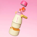 The Chako Lab Tata Thermo with the caps and cup unscrewed in yellow and pink on a pink background