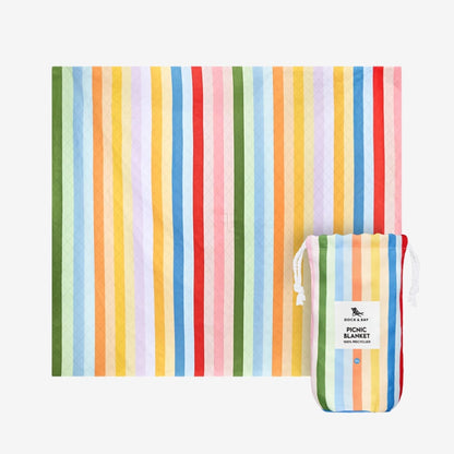 The Dock & Bay Picnic Blanket in Candy Stripe on a grey background