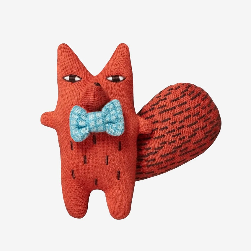 The Donna Wilson Sid Squirrel Fox Wee One on a grey background