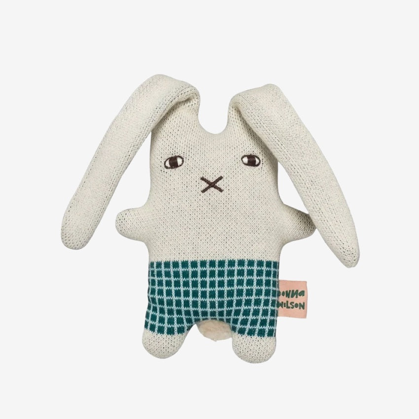 Donna Wilson's Wee One Knitted bunny toy with a green checkered bottom named Bonnie Bunny with ears folded over on a white background