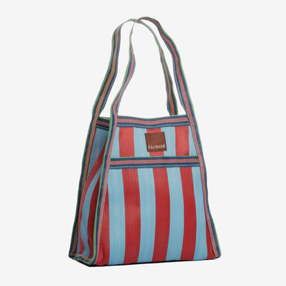 The EAU Sac Bag in Club Rouge on a grey background