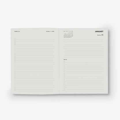 Open planner showing the daily layout with a white background