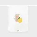 The Father Rabbit Tea Towel in the Jug with Lemon design hanging on a rod