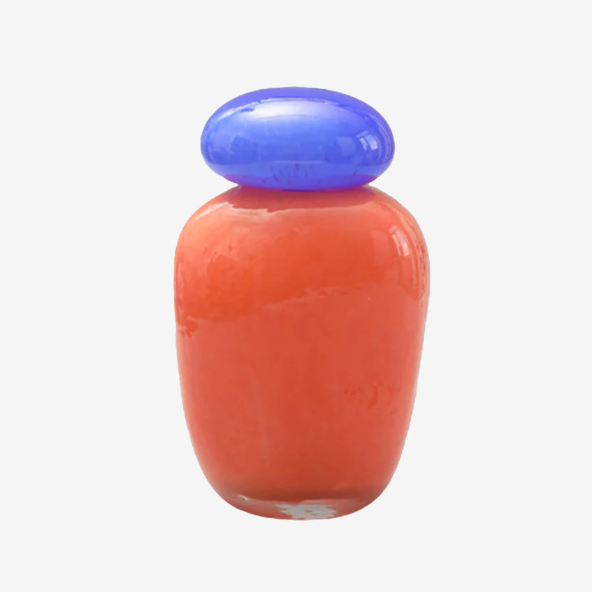 The Garcia Ruby Glass Jar in Medium on a blank background