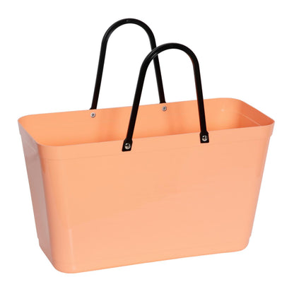 The large Hinza Bag in Apricot on a white background.