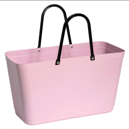 The dusty pink Hinza Bag on a white background