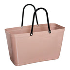 The Hinza Bag in Nougat on a white background.