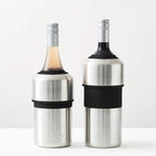 Two of the Huski Wine Cooler in Brushed Stainless with a wine bottles in them