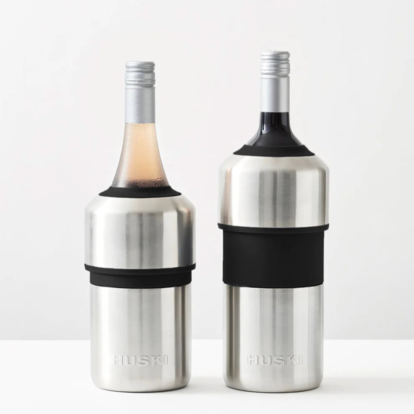 Two of the Huski Wine Cooler in Brushed Stainless with a wine bottles in them