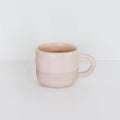 The JS Ceramics Ceramic Mug in Pink Sand on a blank background