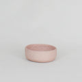 The JS Ceramic Ramekin in Pink Sand on a blank background
