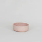 The JS Ceramic Ramekin in Pink Sand on a blank background