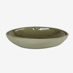 The JS Ceramics Large Oval Bowl in Sage Green on a blank background