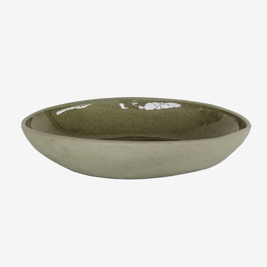 The JS Ceramics Large Oval Bowl in Sage Green on a blank background