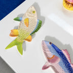 The &Klevering Trigger and Perch Fish Plates on a white table