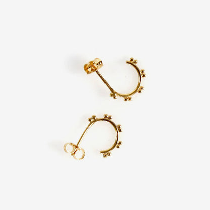 The La Tribe Hoop Studs in gold on a blank background