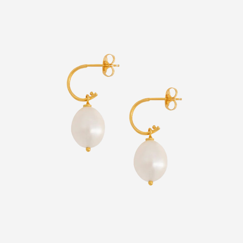 The La Tribe Large Pearl Hoops in Gold on a blank background