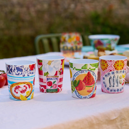 The La La Land Italian Summer Melamine Cup Set on a table setting.