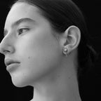 The La Tribe Ball and Chain Studs on a model in Black & White