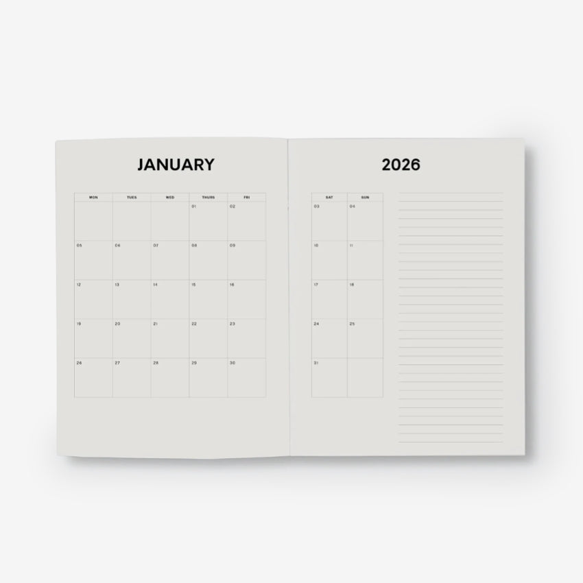 Open planner showing the monthly layout with a white background