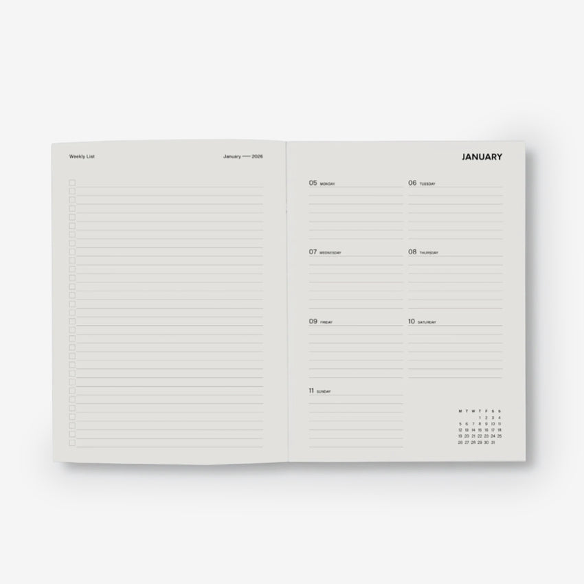 Open planner showing the weekly layout with a white background