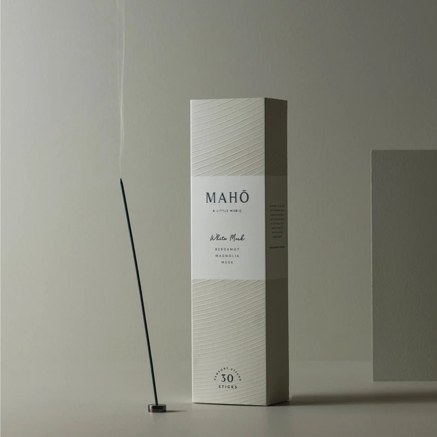 The Maho White Musk Sensory Sticks on a beige background