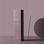 The Maho Wander Bloom Sensory Sticks on a purple background
