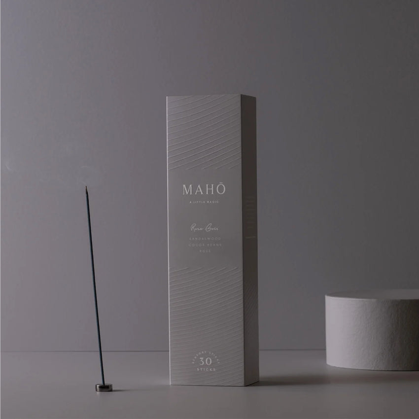 The Maho Rose Bias Sensory Sticks on a grey background