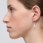 The Meadowlark Magda Signature Hoops in Sterling Silver on a model