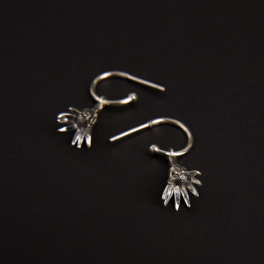 The Meadowlark Magda Signature Hoops in Sterling Silver on black felt