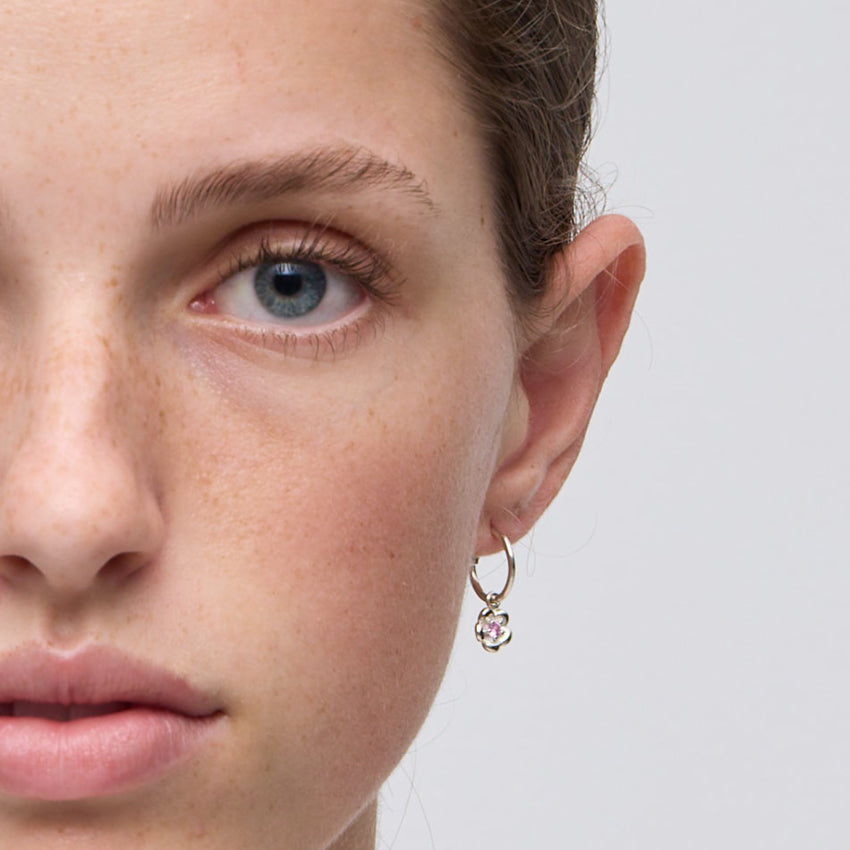 The Meadowlark Posie Signature Hoops in Sterling Silver on a model