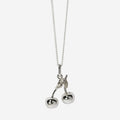 The Meadowlark Cherry Charm Necklace on a 50cm chain in silver on a blank background