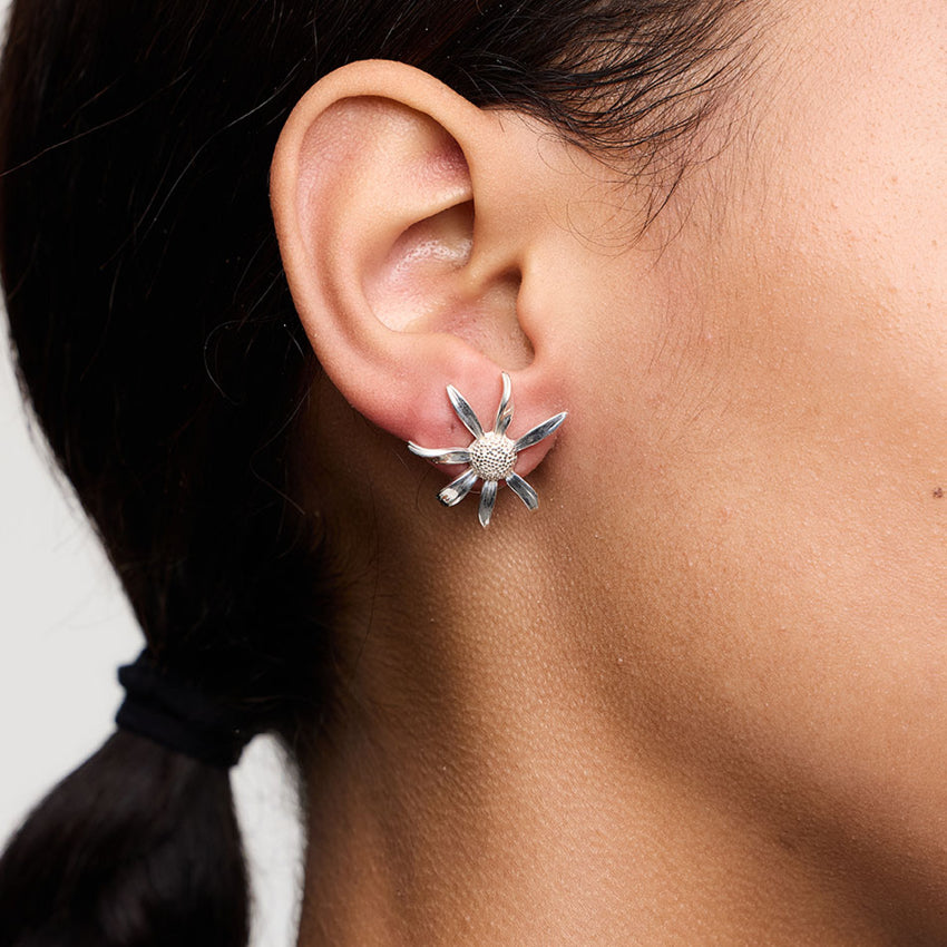 The Meadowlark Daisy Earrings in Medium and Sterling Silver on a model