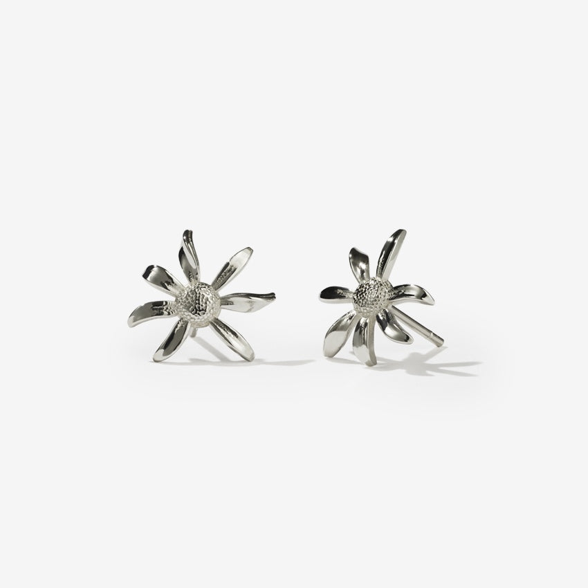 The Meadowlark Daisy Studs in Sterling Silver on a blank background