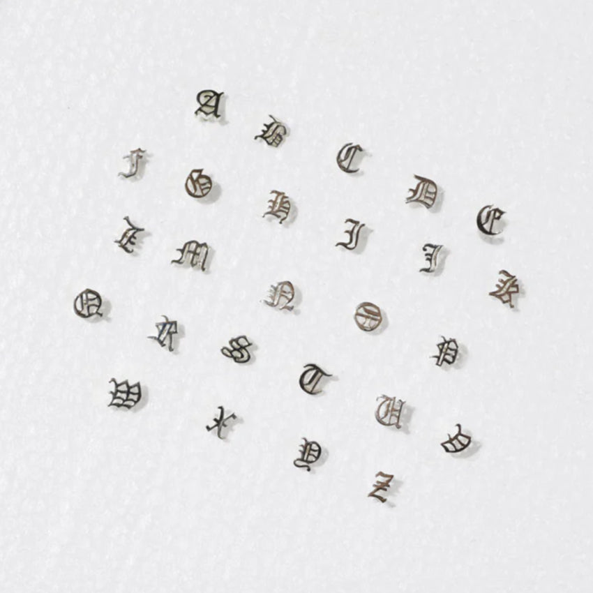 The full range of Meadowlark Letter Studs on a blank background