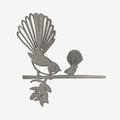 The Metalbird steel Piwakawaka and Baby on a blank background