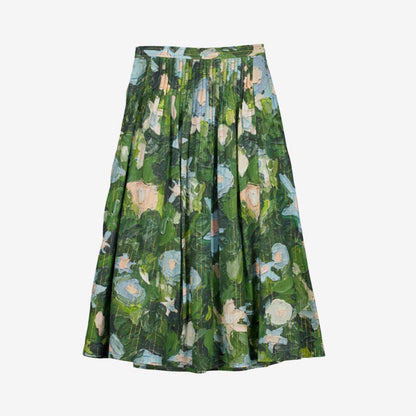 The Nancybird Alma Yoke Skirt in Garden Print on a grey background