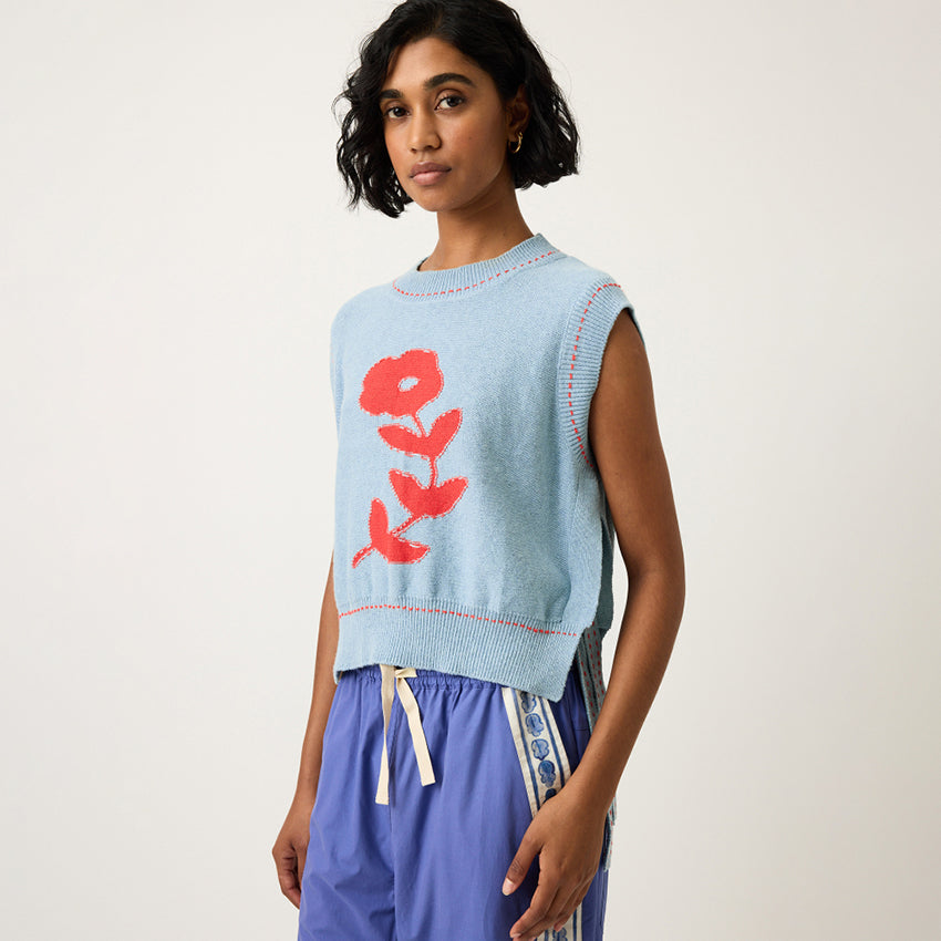 The Nancybird Aria Vest in Flower on a model turned to the side