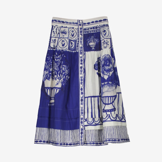 The Nancybird Coco Pintuck Skirt in Lyon Tile on a grey background