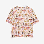 The Nancybird Grace Tee in Warm Watercolour on a grey background