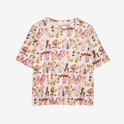 The Nancybird Grace Tee in Warm Watercolour on a grey background