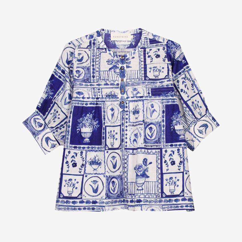 The Nancybird Gwen Blouse in Lyon Tile on a grey background