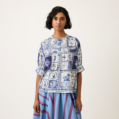 The Nancybird Gwen Blouse in Lyon Tile on a model paired with a skirt