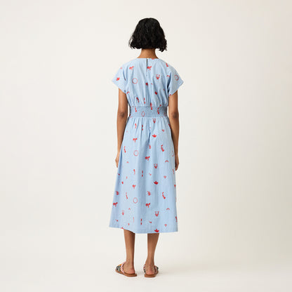 A back view of the  Nancybird Hana Dress in Motif Embroidery on a model