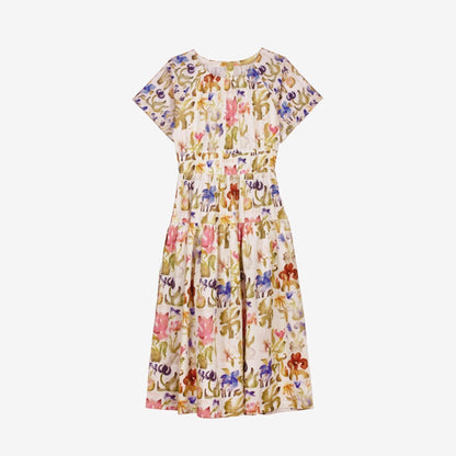 The Nancybird Lola Dress in Watercolour Collage on a grey background